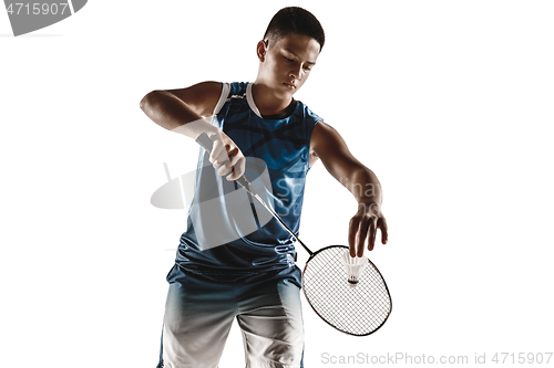 Image of Little boy playing badminton isolated on white studio background