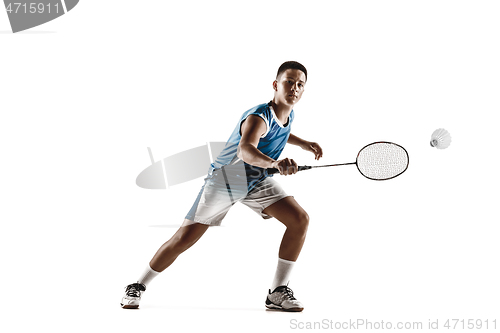 Image of Little boy playing badminton isolated on white studio background