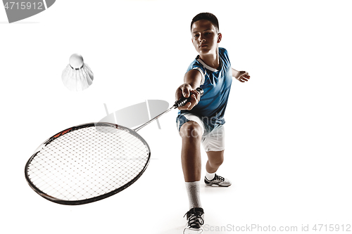 Image of Little boy playing badminton isolated on white studio background