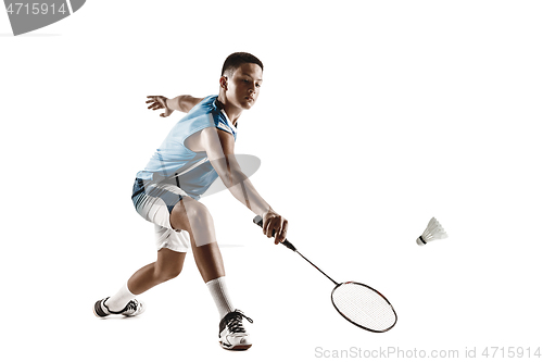 Image of Little boy playing badminton isolated on white studio background