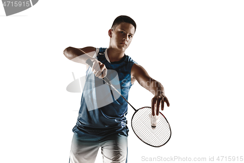 Image of Little boy playing badminton isolated on white studio background