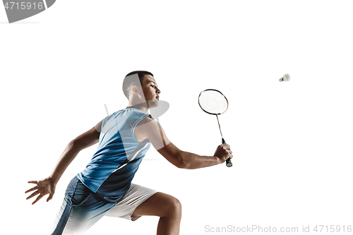 Image of Little boy playing badminton isolated on white studio background