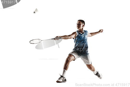 Image of Little boy playing badminton isolated on white studio background