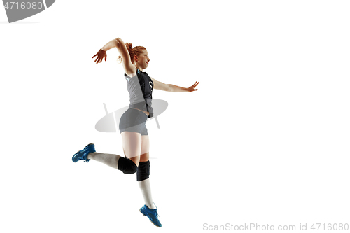 Image of Young female volleyball player isolated on white studio background