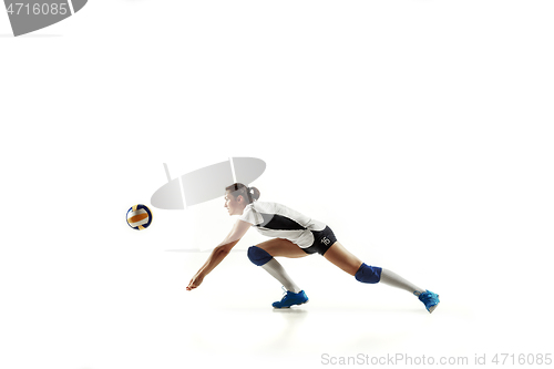 Image of Young female volleyball player isolated on white studio background