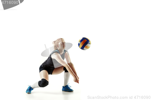 Image of Young female volleyball player isolated on white studio background