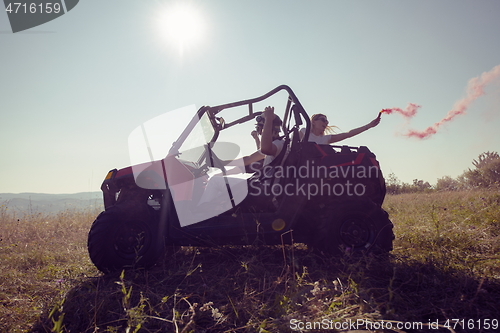 Image of  colorful torches while driving a off road buggy car