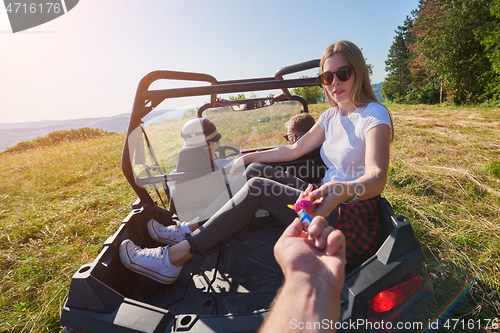 Image of  colorful torches while driving a off road buggy car