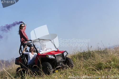 Image of  colorful torches while driving a off road buggy car