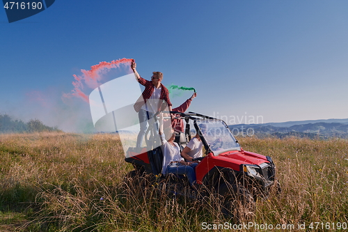 Image of  colorful torches while driving a off road buggy car