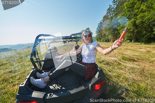 Image of  colorful torches while driving a off road buggy car