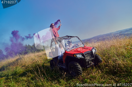 Image of  colorful torches while driving a off road buggy car