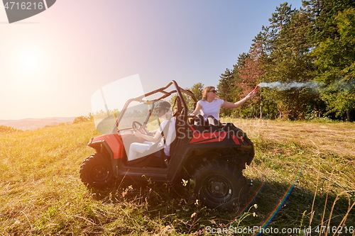 Image of  colorful torches while driving a off road buggy car