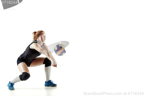 Image of Young female volleyball player isolated on white studio background