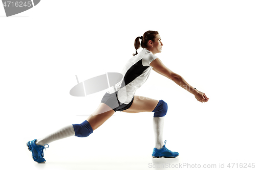 Image of Young female volleyball player isolated on white studio background