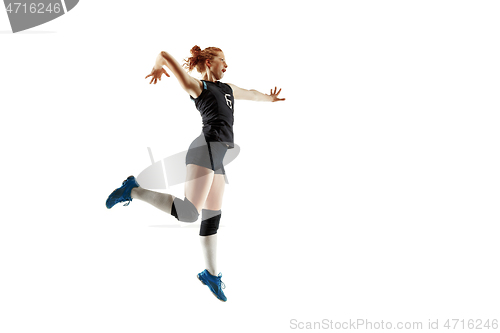 Image of Young female volleyball player isolated on white studio background