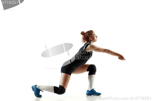 Image of Young female volleyball player isolated on white studio background