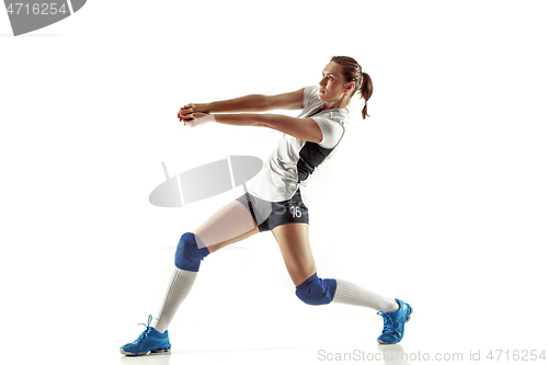 Image of Young female volleyball player isolated on white studio background