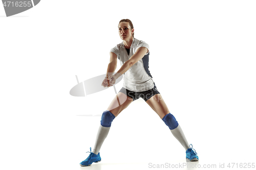 Image of Young female volleyball player isolated on white studio background