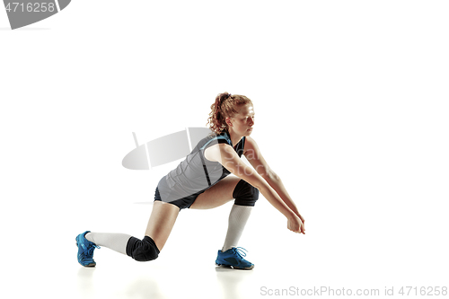 Image of Young female volleyball player isolated on white studio background