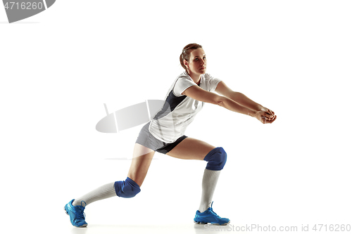 Image of Young female volleyball player isolated on white studio background