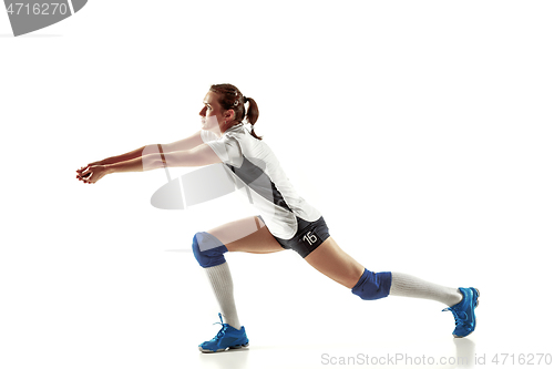 Image of Young female volleyball player isolated on white studio background