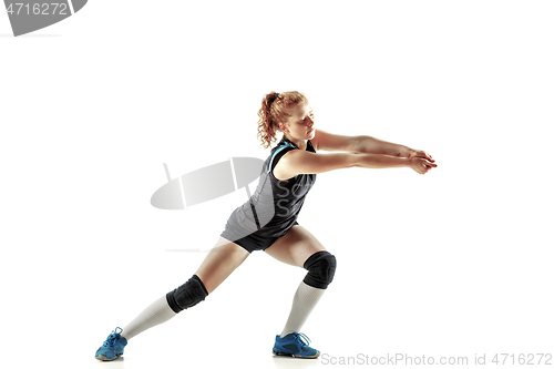 Image of Young female volleyball player isolated on white studio background