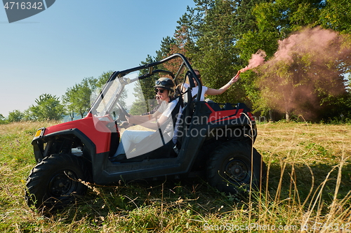 Image of  colorful torches while driving a off road buggy car