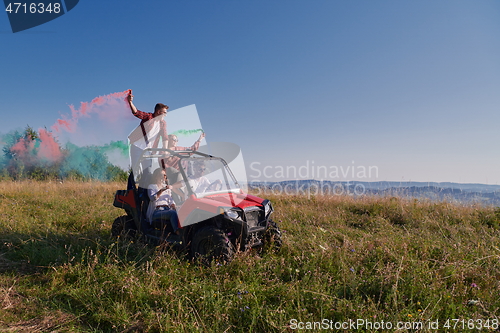 Image of  colorful torches while driving a off road buggy car