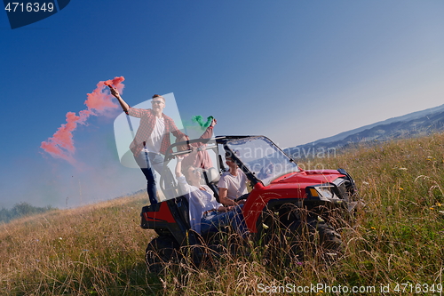 Image of  colorful torches while driving a off road buggy car