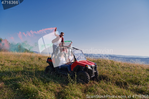 Image of  colorful torches while driving a off road buggy car