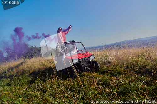 Image of  colorful torches while driving a off road buggy car