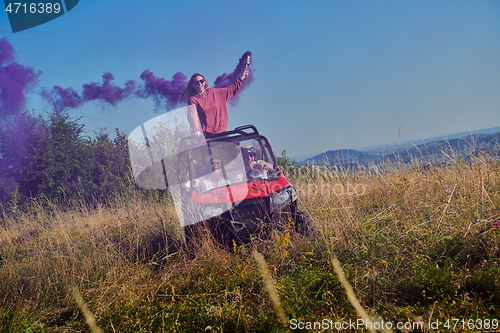 Image of  colorful torches while driving a off road buggy car