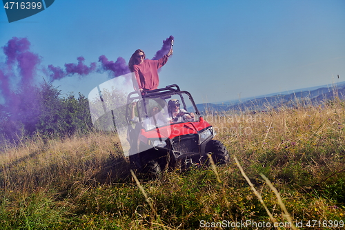 Image of  colorful torches while driving a off road buggy car