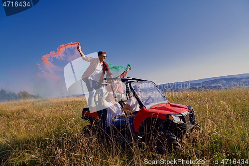 Image of  colorful torches while driving a off road buggy car