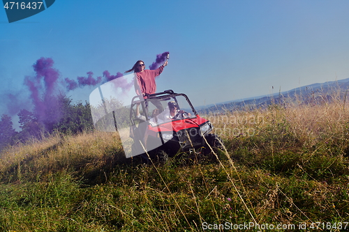 Image of  colorful torches while driving a off road buggy car