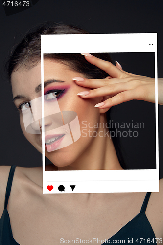 Image of Lie and another life in social media. Girl with make up in photo frame and no make up in real life. Playing pretend.