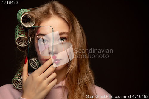 Image of Lie and another life in social media. Girl wearing make up on her face to hide bruises. Playing, pretending happy life.