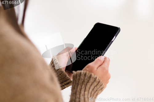 Image of Woman use of smart phone