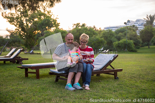 Image of portrait of young happy family