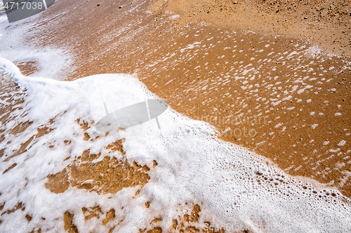 Image of shore detail at the sand beach in Italy