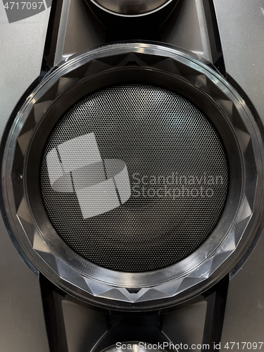 Image of Musical speaker with protective grill