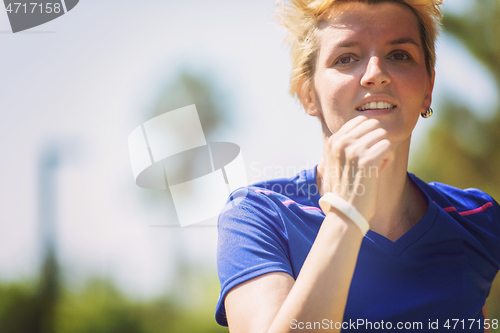 Image of young female runner training for marathon