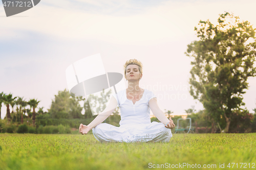 Image of woman doing yoga exercise