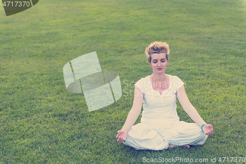 Image of woman doing yoga exercise