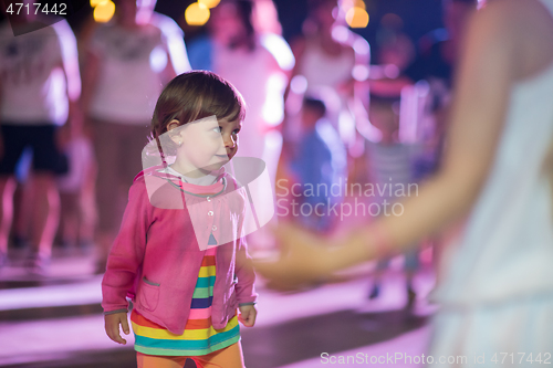 Image of little girl dancing in the kids disco