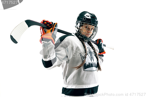 Image of Young female hockey player with the stick isolated on white background