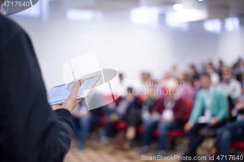 Image of businessman giving presentations at conference room