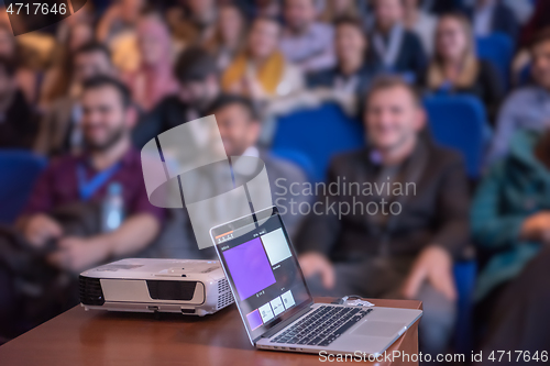 Image of laptop computer at podium