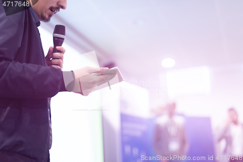 Image of businessman giving presentations at conference room